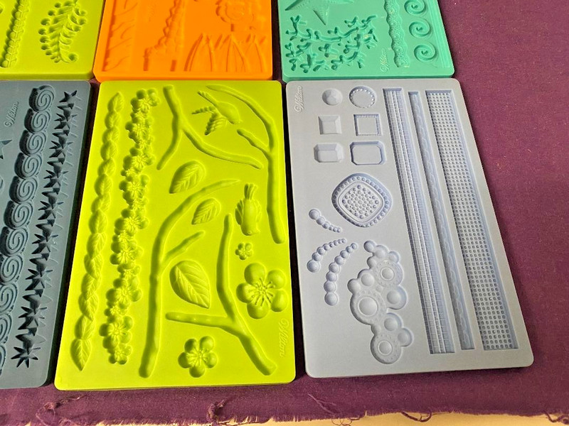 Wilton Silicone fondant molds space water leaves jungle shells buttons Lot of 8 gallery