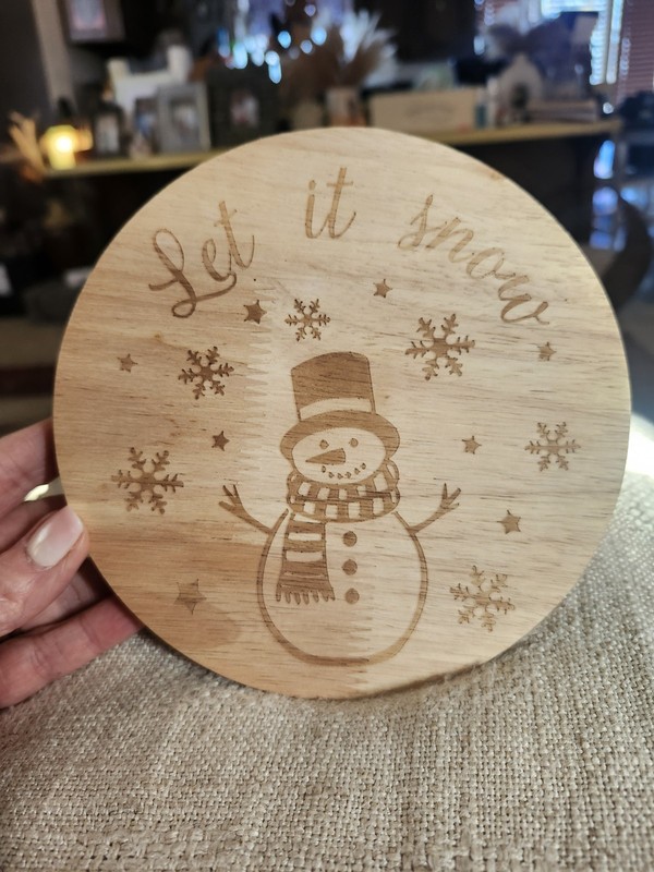 7 Inch Wooden Cake Stand With The Phrase "Let It Snow" With Snowman And Flakes gallery