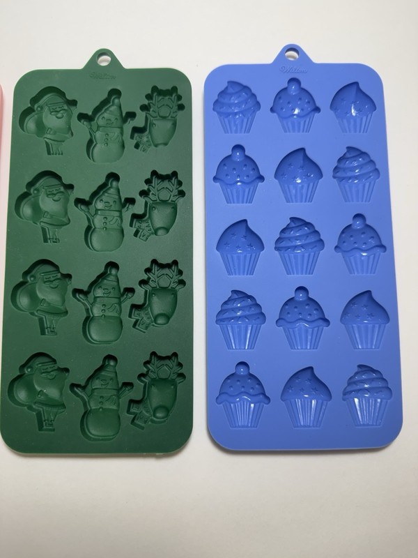 Four Wilton Silicone Candy Molds Hearts, Cupcakes, Stars, Holiday gallery